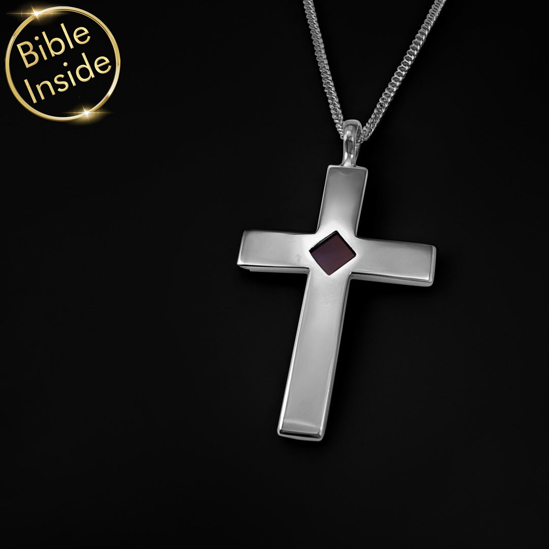 Christian pendant featuring cross symbol with microchip Bible inside