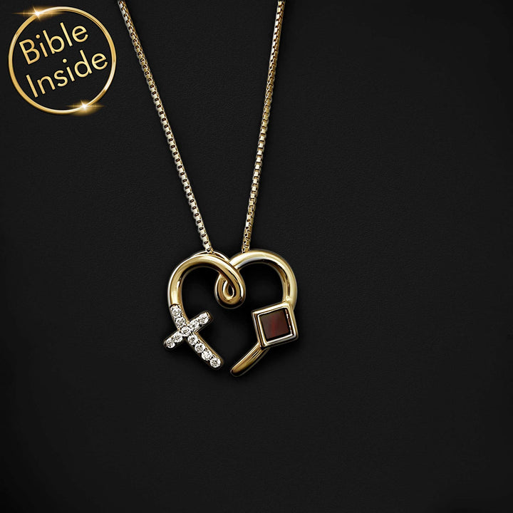 Christian Bible on jewelry featuring delicate heart pendant charm