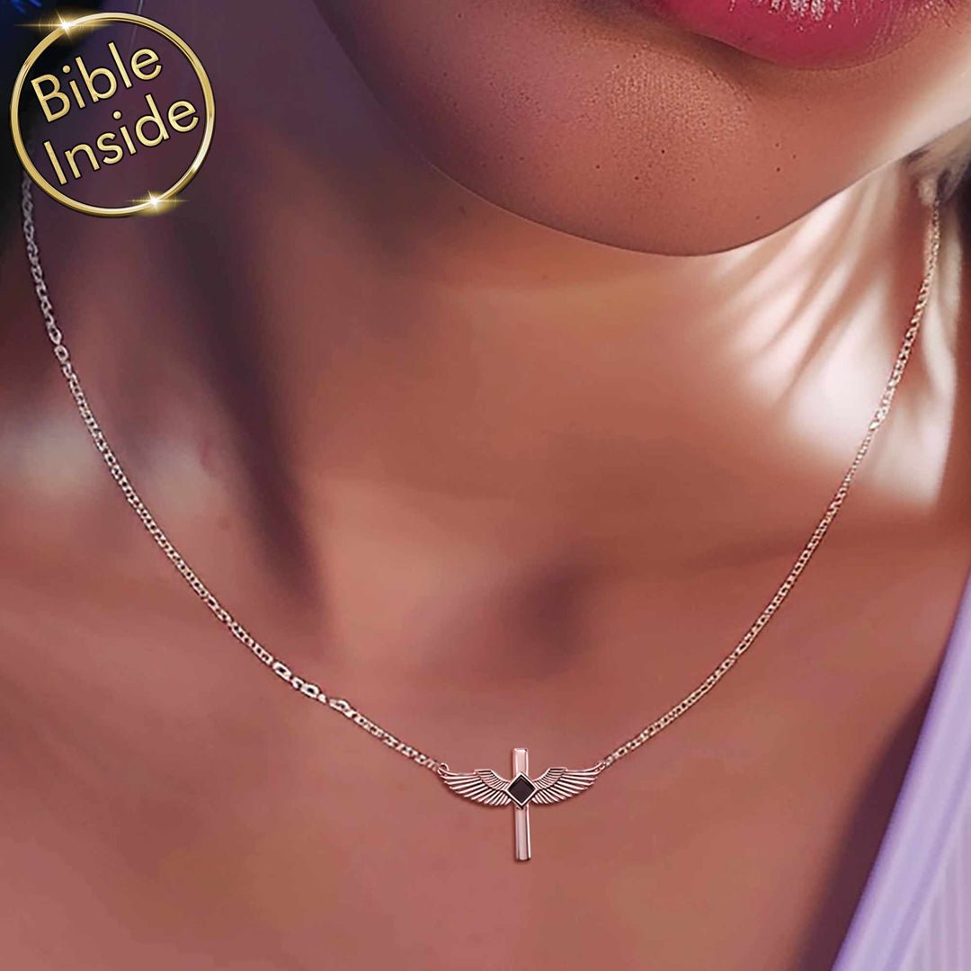 Bible jewelry featuring scripture inside elegant cross pendant