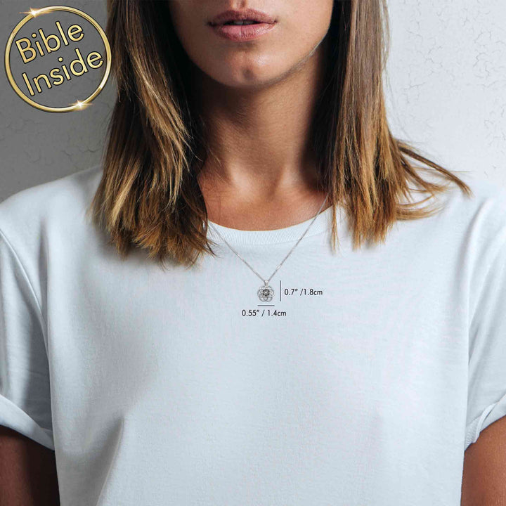 Modern Christian jewelry featuring harmony symbol and Biblical text