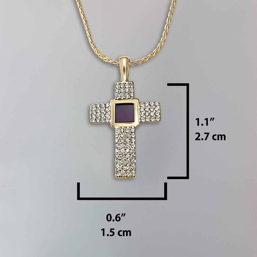Christian xmas gift featuring Aurora cross pendant with New Testament inside
