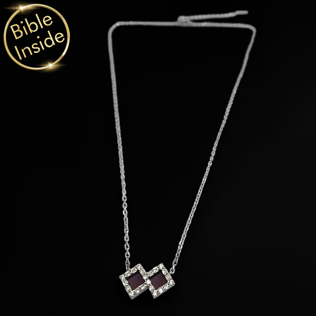Christian Bible verse on jewelry with microscopic Testament inside