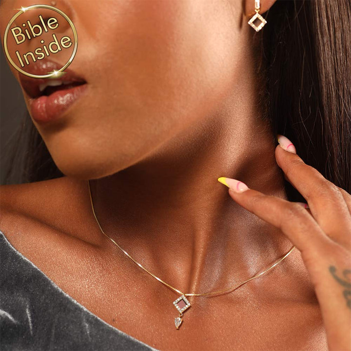 Christian symbol pendant featuring nano Bible and CZ accents